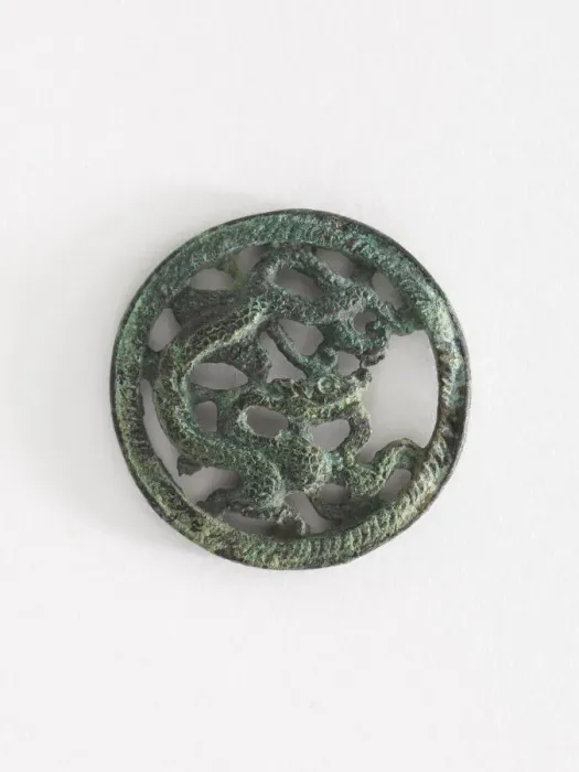 Framed Print : Costume ornament: dragon in roundel (pair with F1917. 566), Goryeo period Framed Print : Costume ornament: dragon in roundel (pair with F1917. 566), Goryeo period