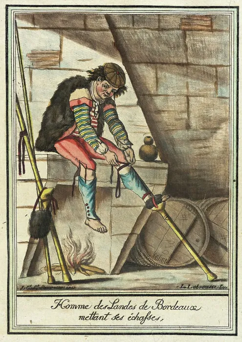 Framed Print : Costumes de Différent Pays, Homme des Landes de Bordeaux Mettant ses Échasses, c1797. Creators: Jacques Grasset de Saint-Sauveur, LF Labrousse Framed Print : Costumes de Différent Pays, Homme des Landes de Bordeaux Mettant ses Échasses, c1797. Creators: Jacques Grasset de Saint-Sauveur, LF Labrousse