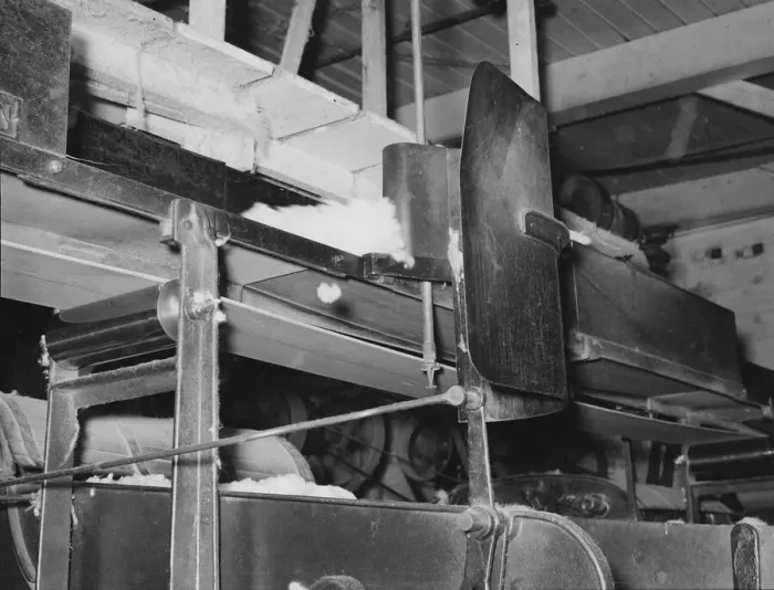 Framed Print : Cotton from the bale is transported by belt... for making bats, Laurel, Mississippi, 1939. Creator: Dorothea Lange Framed Print : Cotton from the bale is transported by belt... for making bats, Laurel, Mississippi, 1939. Creator: Dorothea Lange