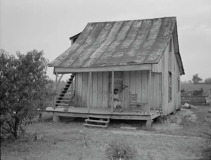 Framed Print : Cotton field hand sitting on her porch on Sunday afternoon, near Blytheville, Arkansas, 1937. Creator: Dorothea Lange Framed Print : Cotton field hand sitting on her porch on Sunday afternoon, near Blytheville, Arkansas, 1937. Creator: Dorothea Lange