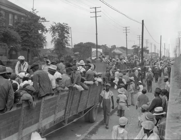 Framed Print : Cotton hoers loading at Memphis, Tennessee for the day's work in Arkansas, 1937. Creator: Dorothea Lange Framed Print : Cotton hoers loading at Memphis, Tennessee for the day's work in Arkansas, 1937. Creator: Dorothea Lange