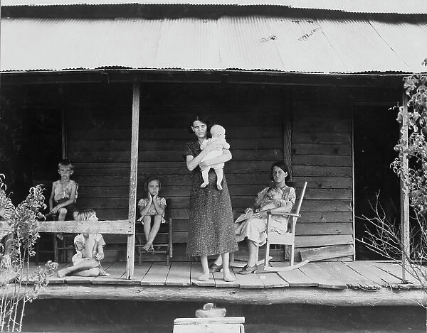 Cotton sharecropper family, Macon County, Georgia, 1937. Creator: Dorothea Lange