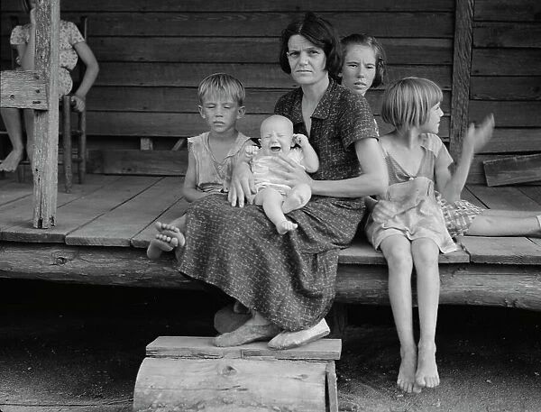 Cotton sharecropper family, Macon County, Georgia, 1937. Creator: Dorothea Lange