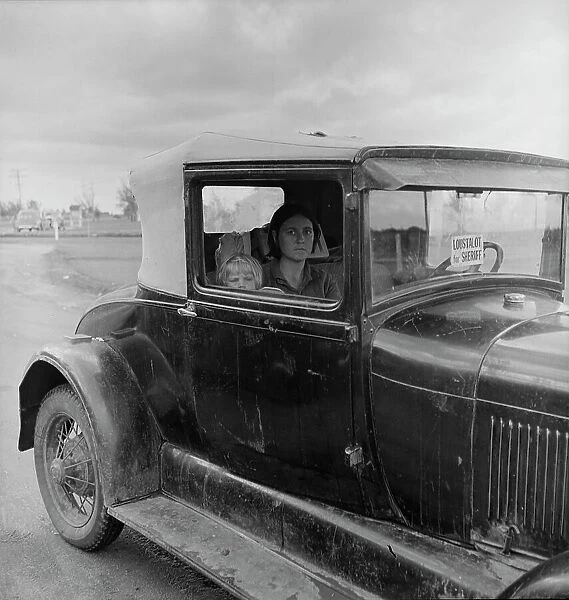 During the cotton strike, a striking picker applies for an emergency food grant, Shafter, CA, 1938. Creator: Dorothea Lange