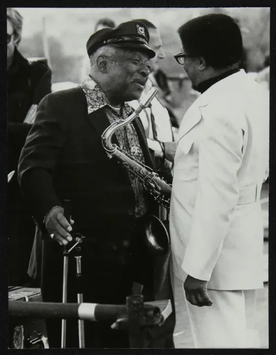 Framed Print : Count Basie chatting with Illinois Jacquet at the Capital Radio Jazz Festival, London, July 1979 Framed Print : Count Basie chatting with Illinois Jacquet at the Capital Radio Jazz Festival, London, July 1979