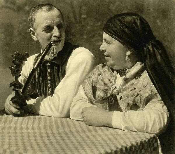 Couple in traditional dress, Upper Austria, c1935. Creator: Unknown