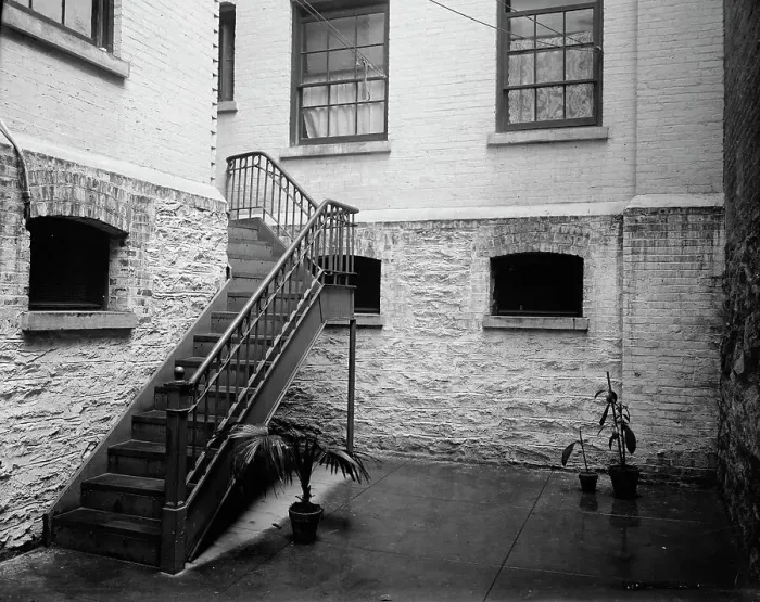 Framed Print : Court of tenement house, New York City, between 1900 and 1910. Creator: Unknown Framed Print : Court of tenement house, New York City, between 1900 and 1910. Creator: Unknown