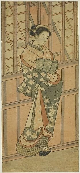 Courtesan Standing in Front of a Barred Window, c. 1765. Creator: Ishikawa Toyonobu