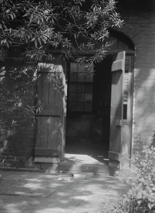 Framed Print : Courtyard, New Orleans, between 1920 and 1926. Creator: Arnold Genthe Framed Print : Courtyard, New Orleans, between 1920 and 1926. Creator: Arnold Genthe