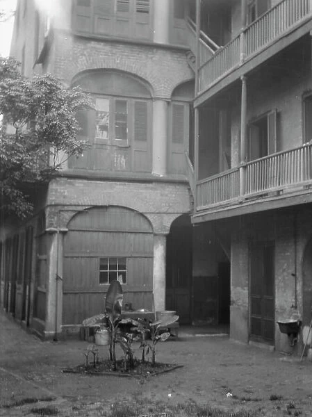 Courtyard, New Orleans, between 1920 and 1926. Creator: Arnold Genthe