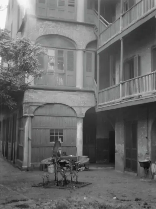 Framed Print : Courtyard, New Orleans, between 1920 and 1926. Creator: Arnold Genthe Framed Print : Courtyard, New Orleans, between 1920 and 1926. Creator: Arnold Genthe