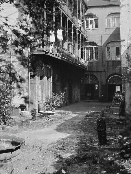 Courtyard, New Orleans, between 1920 and 1926. Creator: Arnold Genthe