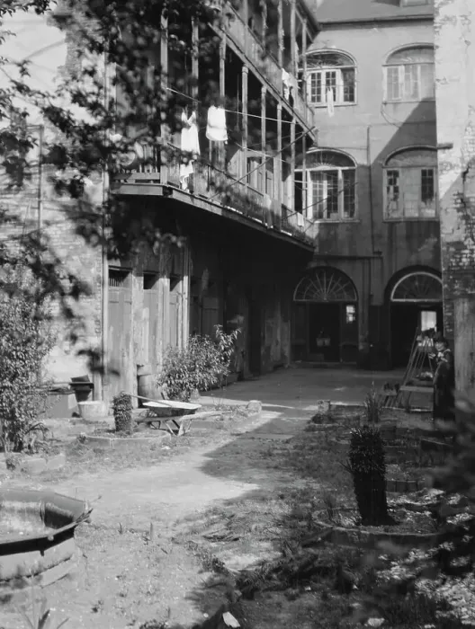 Framed Print : Courtyard, New Orleans, between 1920 and 1926. Creator: Arnold Genthe Framed Print : Courtyard, New Orleans, between 1920 and 1926. Creator: Arnold Genthe