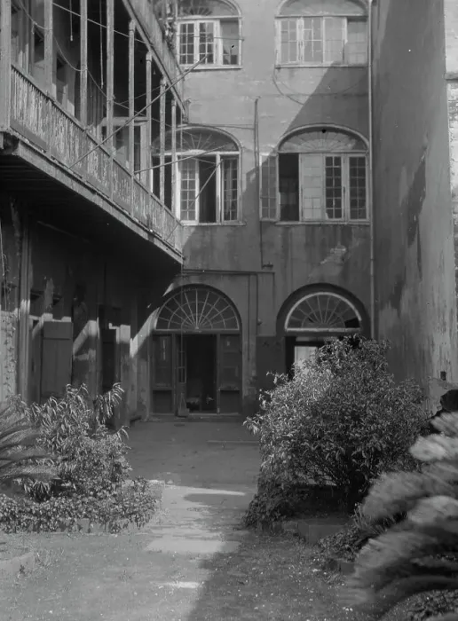 Framed Print : Courtyard, New Orleans, between 1920 and 1926. Creator: Arnold Genthe Framed Print : Courtyard, New Orleans, between 1920 and 1926. Creator: Arnold Genthe