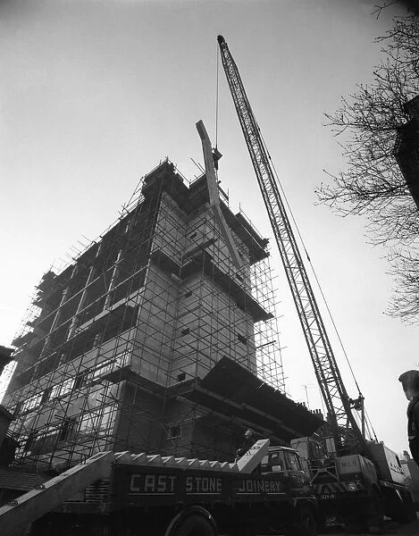 Crane lifting staircase carriageways into a new office building, Sheffield, South Yorkshire, 1961