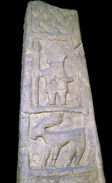 Cross-shaft fragment showing a warrior with sword, spear, 10th century