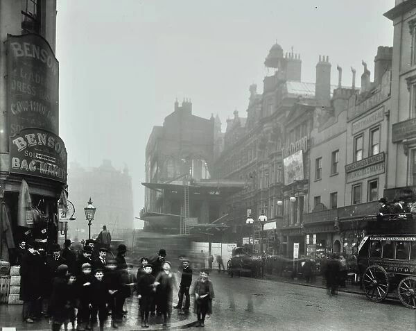 Crowd of people in the street, Tottenham Court Road, London, 1900