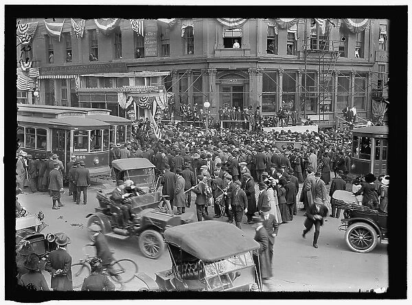 Crowd and Trolley cars at corner of Pennsylvania Ave. and 15th Street, N.W... between 1913 and 1917 Creator: Harris & Ewing. Crowd and Trolley cars at corner of Pennsylvania Ave