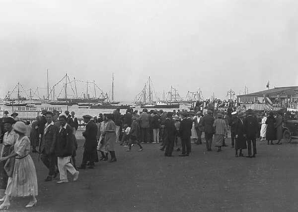 Crowds on the water front during a regatta, c1930. Creator: Kirk & Sons of Cowes