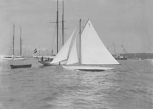 The cutter Folly under sail. Creator: Kirk & Sons of Cowes