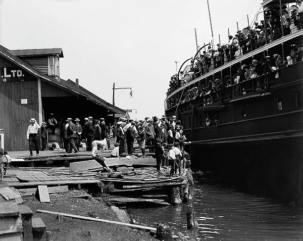 D. & C. [Detroit & Cleveland Navigation Co.] steamer at dock, Cheboygan, Mich. c1900-1910. Creator: Unknown. D. & C. [Detroit & Cleveland Navigation Co.] steamer at dock, Cheboygan, Mich. c1900-1910. Creator: Unknown