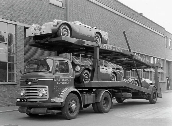 Daimler Dart SP250s on car transporter for delivery 1960. Creator: Unknown