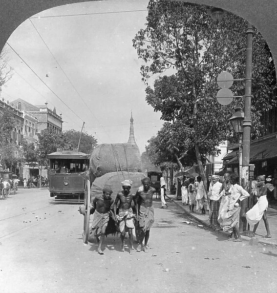 Dalhousie Street, busiest in the city, Rangoon, Burma, 1908. Artist: Stereo Travel Co