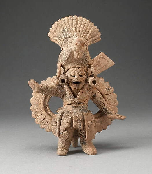 Dancing Figure Wearing Animal Headdress and Ornate Costume, A. D. 600  /  900