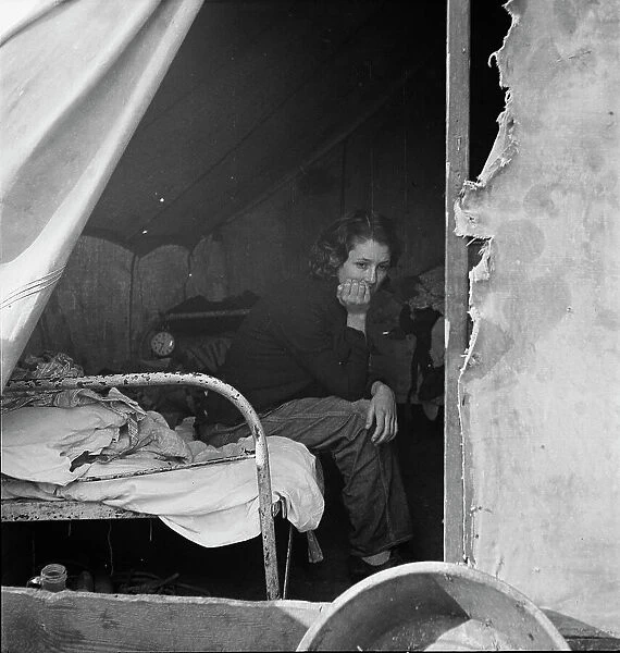Daughter of migrant Tennessee coal miner, living in the American River Camp... CA, 1936. Creator: Dorothea Lange