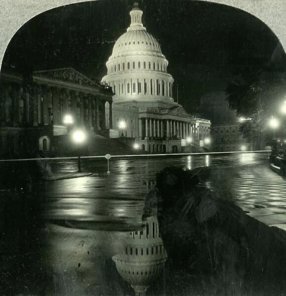 The Dazzling Dome of the Capitol on a Rainy Night, Washington D. C. c1930s. Creator: Unknown