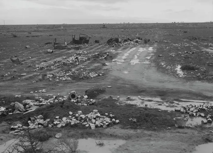Framed Print : Debris left out on the flats where squatters camp stood, Kern County, 1939. Creator: Dorothea Lange Framed Print : Debris left out on the flats where squatters camp stood, Kern County, 1939. Creator: Dorothea Lange