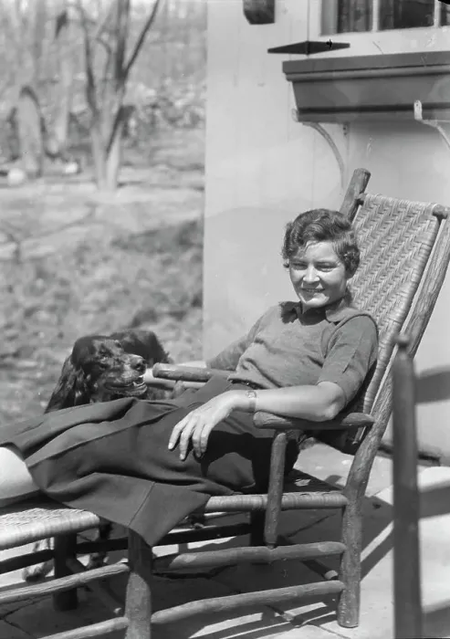 Framed Print : DeLamar, Alice, Miss, with dog, seated outdoors, between 1927 and 1942. Creator: Arnold Genthe Framed Print : DeLamar, Alice, Miss, with dog, seated outdoors, between 1927 and 1942. Creator: Arnold Genthe