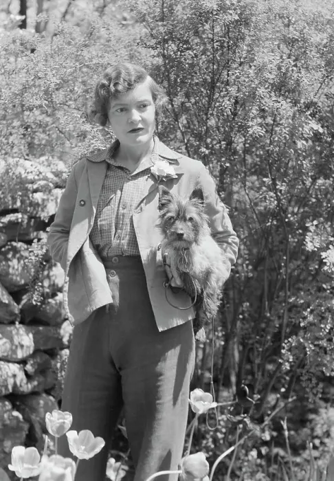 Framed Print : DeLamar, Alice, Miss, with dog, standing outdoors, between 1927 and 1942. Creator: Arnold Genthe Framed Print : DeLamar, Alice, Miss, with dog, standing outdoors, between 1927 and 1942. Creator: Arnold Genthe