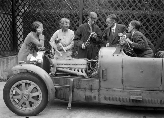 Framed Print : Denis Evans inspecting the plugs of his Bugatti Type 43 2262cc. Artist: Bill Brunell Framed Print : Denis Evans inspecting the plugs of his Bugatti Type 43 2262cc. Artist: Bill Brunell