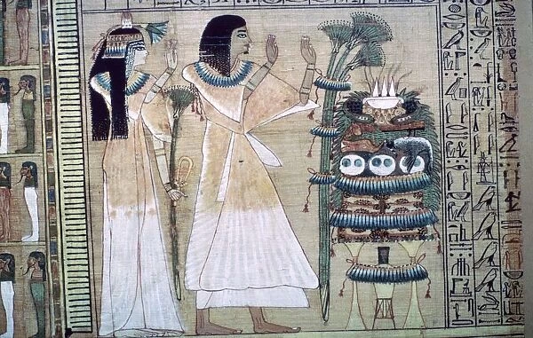 Depiction of a man and his wife making offerings to Osiris