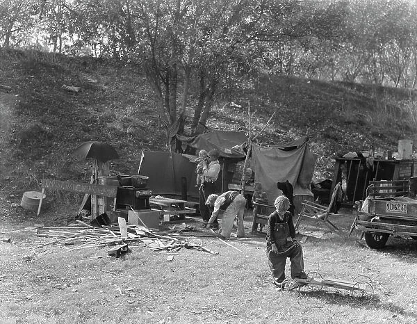 Destitute family, American River camp, near Sacramento, California. 1936. Creator: Dorothea Lange