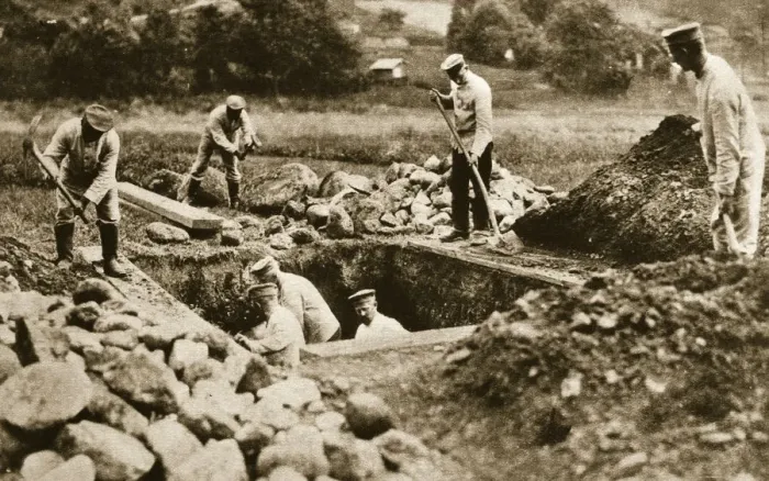Framed Print : Digging mass graves behind the German lines, World War I, c1914-c1918 Framed Print : Digging mass graves behind the German lines, World War I, c1914-c1918