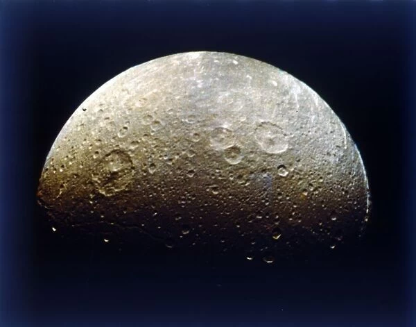 Dione, one of Saturns moons. Creator: NASA