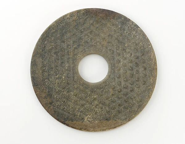 Disk (bi) with knobs, Warring States period or early Han dynasty, 475-100 BCE