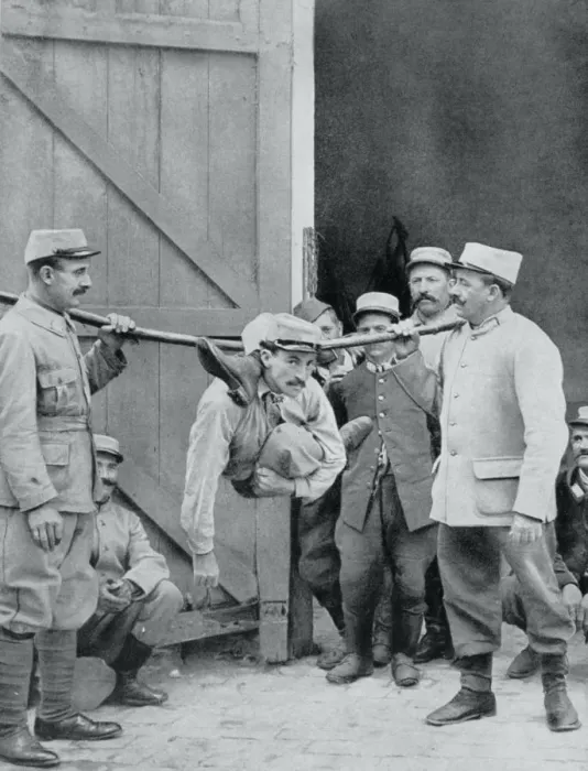 Framed Print : Distractions at the front; the human serpent, France, World War I, 1915 Framed Print : Distractions at the front; the human serpent, France, World War I, 1915