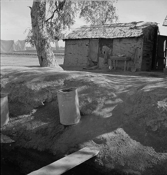Ditch bank housing for Mexican field workers, Imperial Valley, California, 1937. Creator: Dorothea Lange