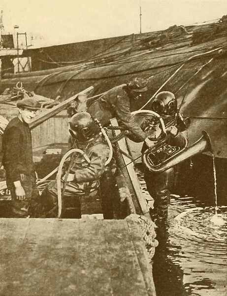 A Diver With Euphonium and Swords from the German Kaiser Scuttled at Scapa, c1930