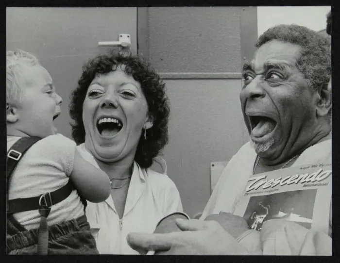 Framed Print : Dizzy Gillespie meeting baby Gary Colfer at Knebworth, Hertfordshire, July 1982. Artist Framed Print : Dizzy Gillespie meeting baby Gary Colfer at Knebworth, Hertfordshire, July 1982. Artist