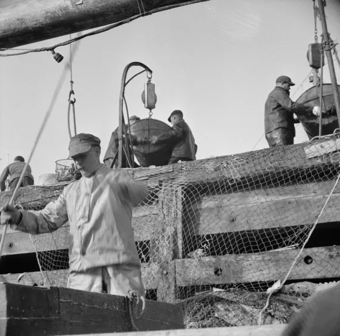 Framed Print : Dock stevedores at the Fulton fish market sending up baskets of fish... New York, 1943. Creator: Gordon Parks Framed Print : Dock stevedores at the Fulton fish market sending up baskets of fish... New York, 1943. Creator: Gordon Parks