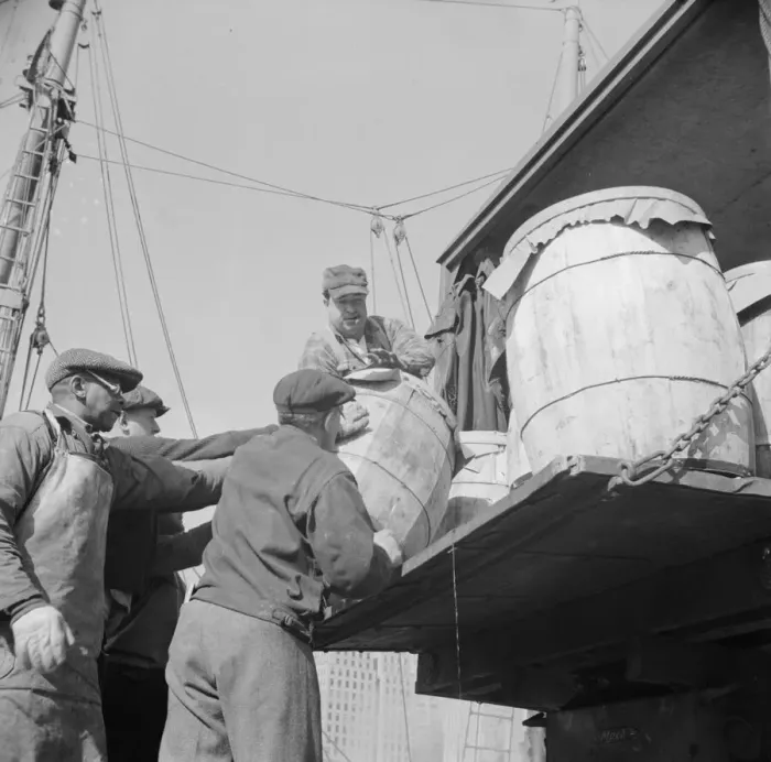 Framed Print : Dock worker at the Fulton fish market loading fish that have been caught... New York, 1943. Creator: Gordon Parks Framed Print : Dock worker at the Fulton fish market loading fish that have been caught... New York, 1943. Creator: Gordon Parks