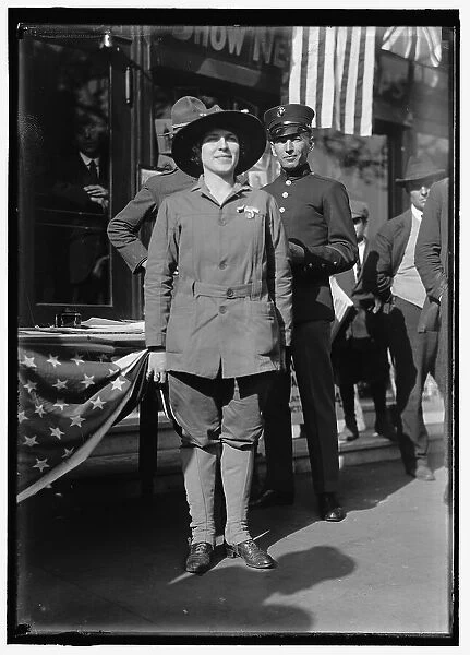 Dora Rodrigues, recruiter for service branches, possibly in front of the Cosmos Theater... May 1917 Creator: Harris & Ewing. Dora Rodrigues, recruiter for service branches, possibly in front of the Cosmos Theater