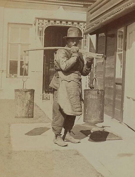 Dou Kee, one of the Chinese servants, carrying water buckets, Dom Smith, Vladivostok, Russia, 1899. Creator: Eleanor Lord Pray