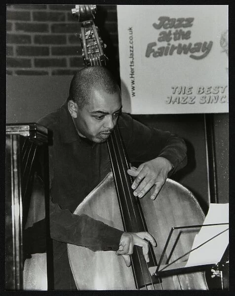 Double bassist Gary Crosby playing at The Fairway, Welwyn Garden City, Hertfordshire, 2004