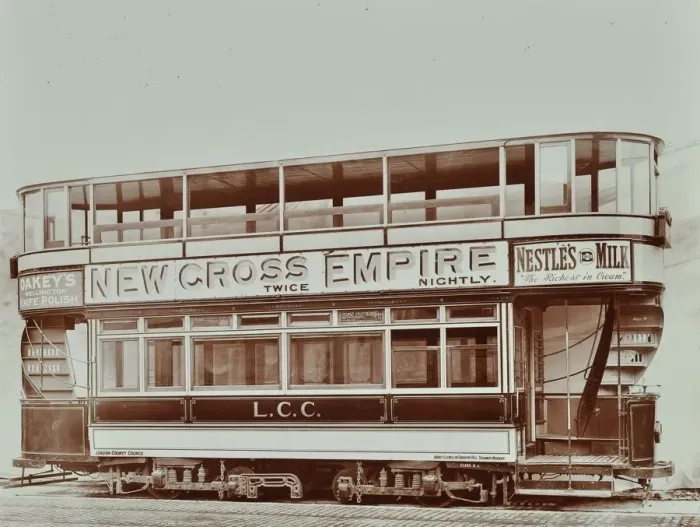 Framed Print : Double-decker electric tram with advertisement for the New Cross Empire, 1907 Framed Print : Double-decker electric tram with advertisement for the New Cross Empire, 1907