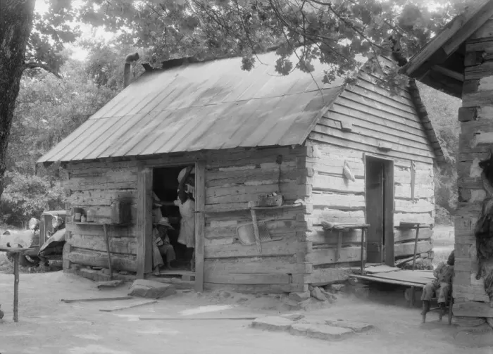 Framed Print : Double log cabin of Negro share tenants who raise tobacco, Person County, North Carolina, 1939. Creator: Dorothea Lange Framed Print : Double log cabin of Negro share tenants who raise tobacco, Person County, North Carolina, 1939. Creator: Dorothea Lange